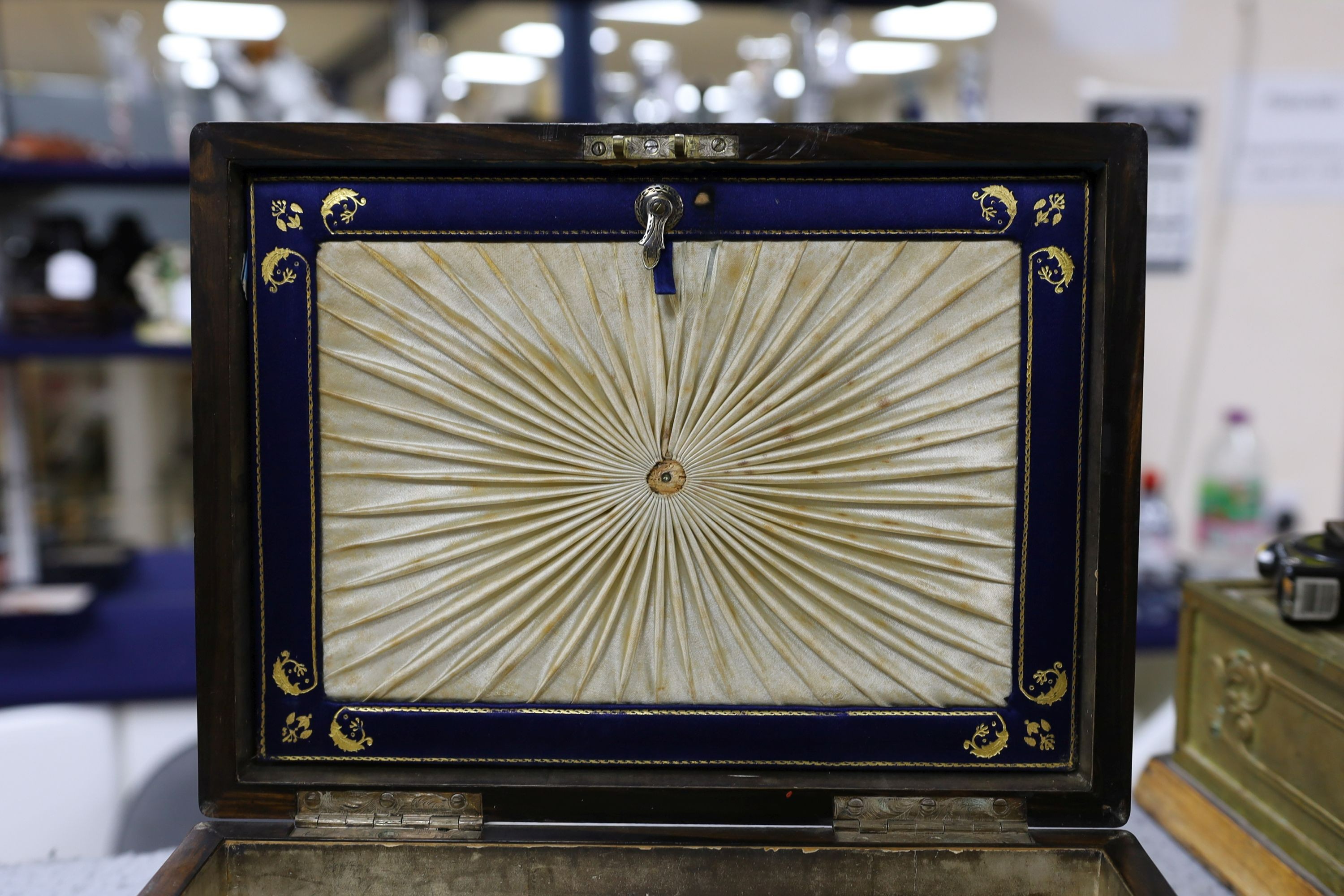A French rosewood brass inlay and enamelled box, interior missing, 31 cms wide x 12 cms high